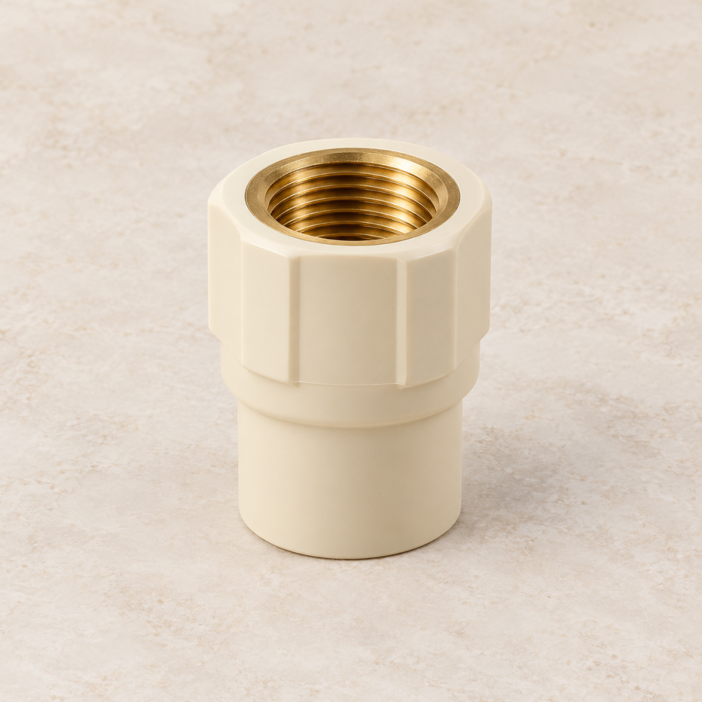 Illustrative cream CPVC female threaded adapter with brass insert